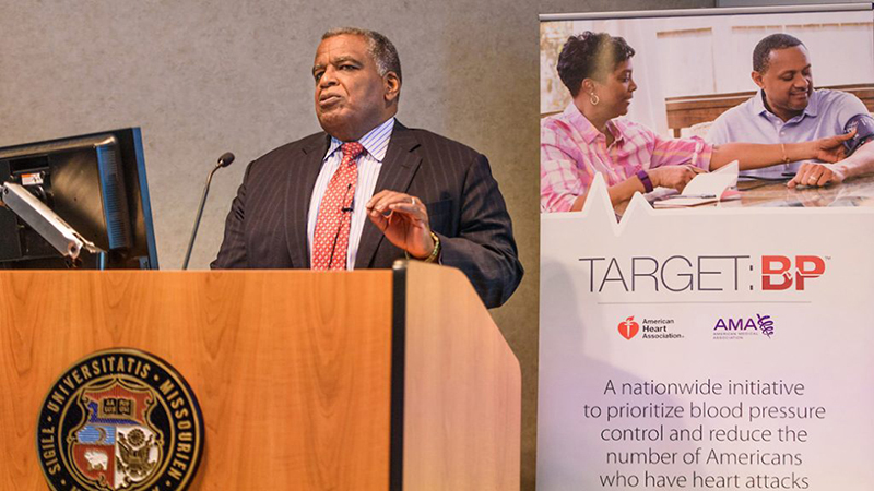 Hypertension expert Keith Ferdinand, MD, speaks in Acuff Auditorium about the new national guidelines lowering the threshold for the diagnosis of high blood pressure.