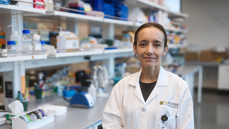 A photo of Dr. Camila Manrique-Acevedo in a lab.
