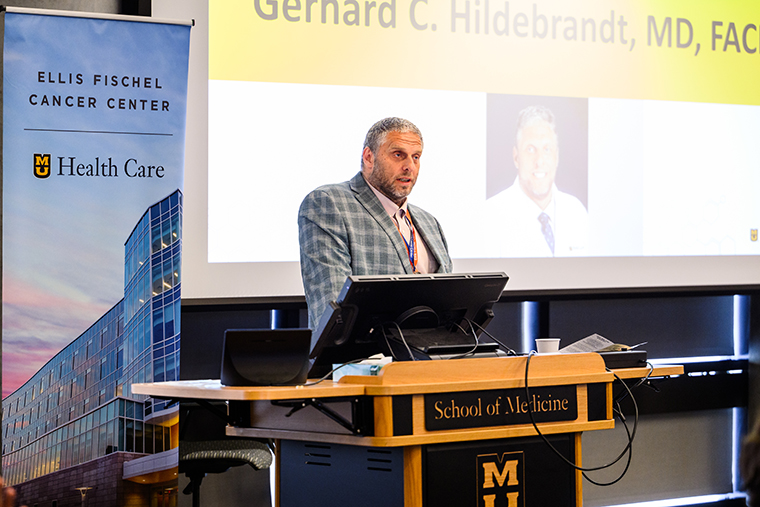 Dr. Hildebrandt speaks to attendees at the 2026 Ellis Fischel Cancer Center Cancer Research Day.