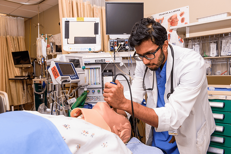 Photo of medical student in SIM lab