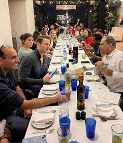 Dr. Resnick and Dr. Gupta dine with the other visiting international surgeons