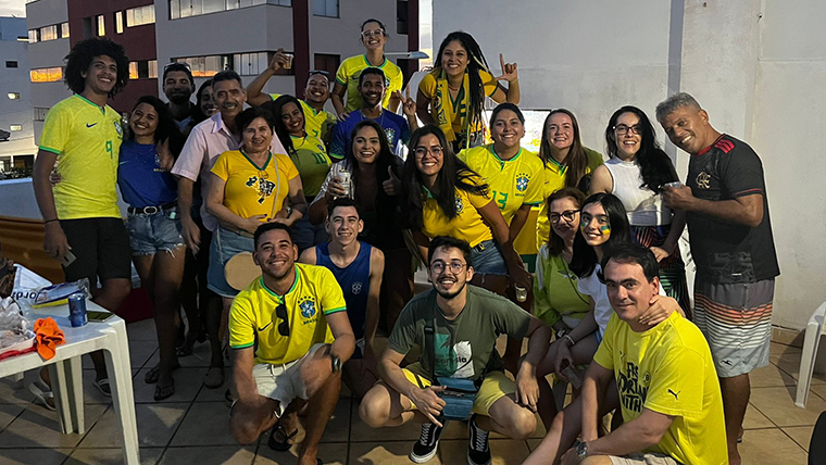 Nicole Hitchcock poses with friends in Brazil while watching the 2022 World Cup.