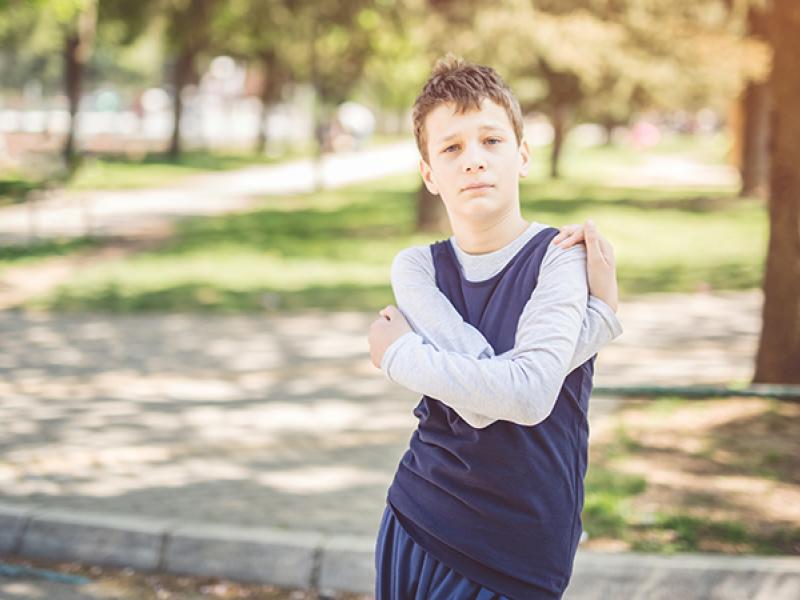 depressed boy in park