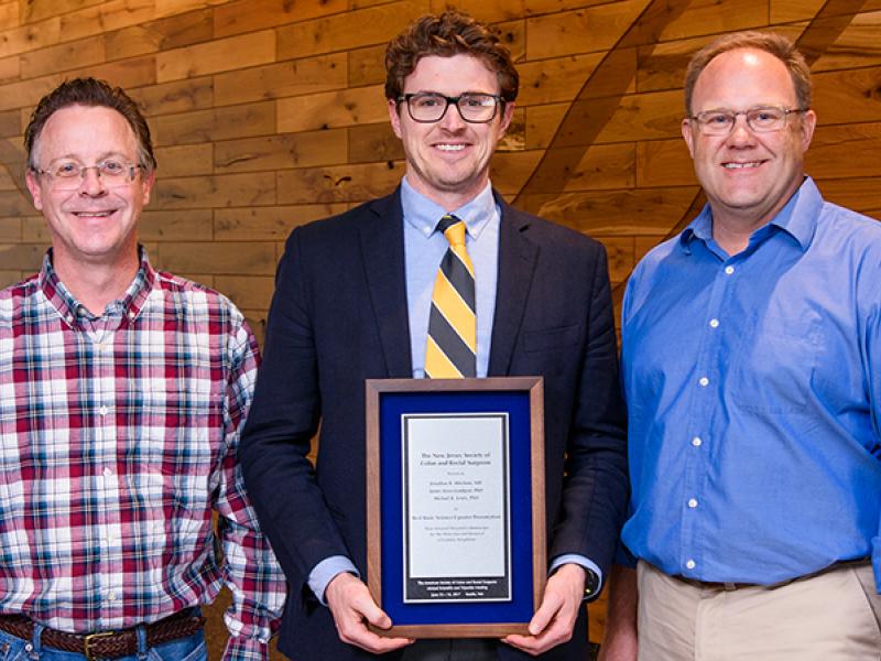 Michael Lewis, Jonathan Mitchem, James Amos-Landgraf