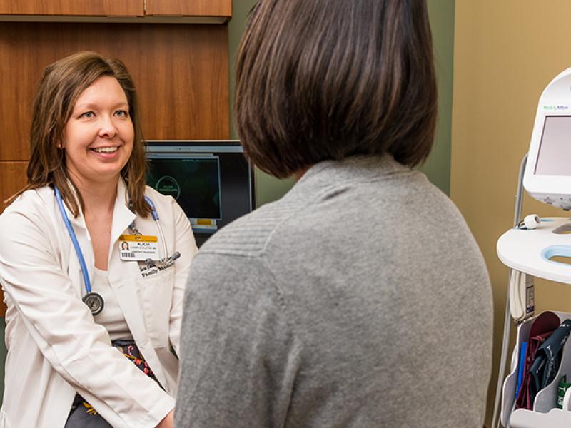 Family and Community Medicine doc with patient