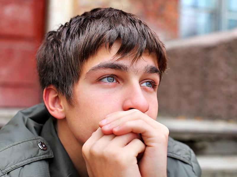 young man looking sad