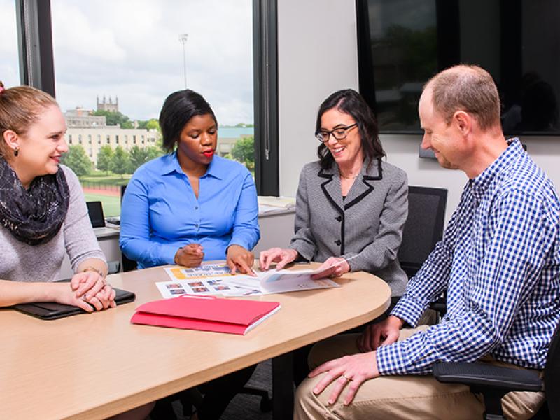 group of people at a conference table