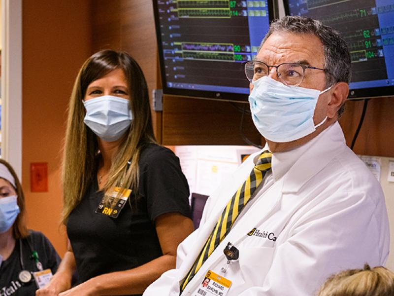 Richard Barohn, MD attends morning huddle