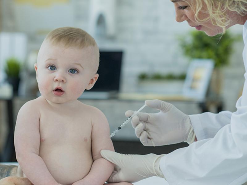 toddler getting a vaccine